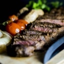 beef sliced on chopping board