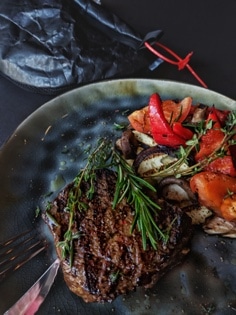 steak with rosemary and salad