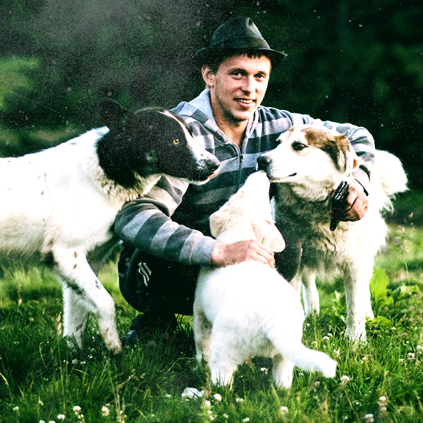 A farmer with his dogs