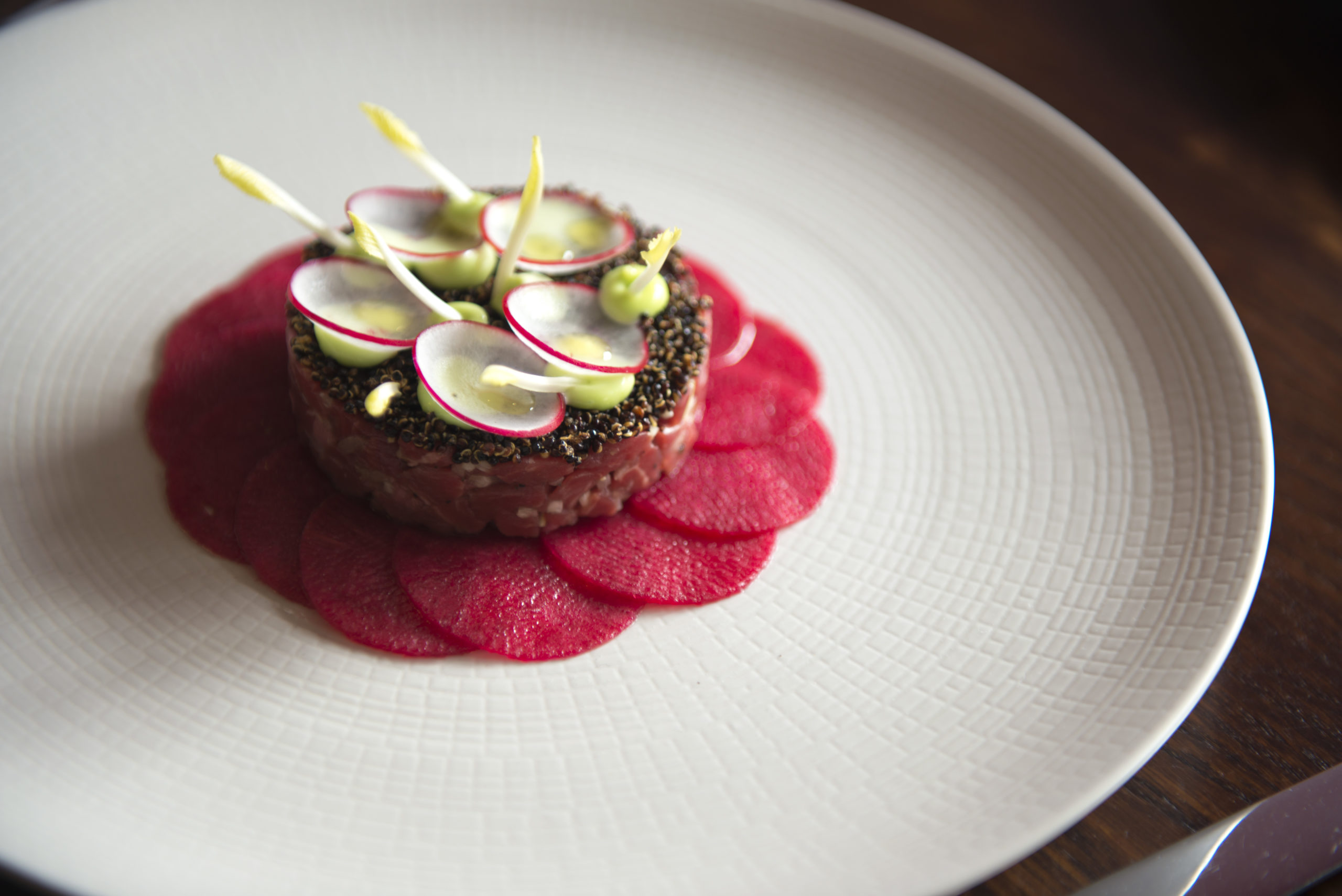 Tartare of dry aged Irish beef prime fillet with pickled radish, wasabi and quinoa