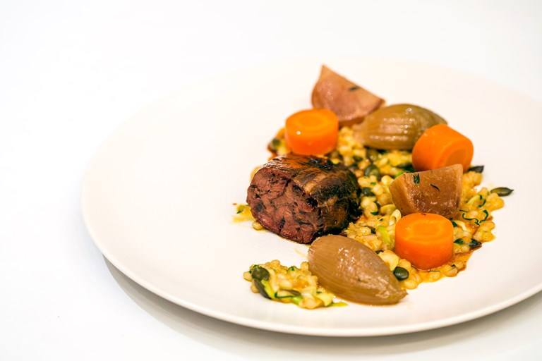 Braised beef shin with pumpkin seed and barley porridge