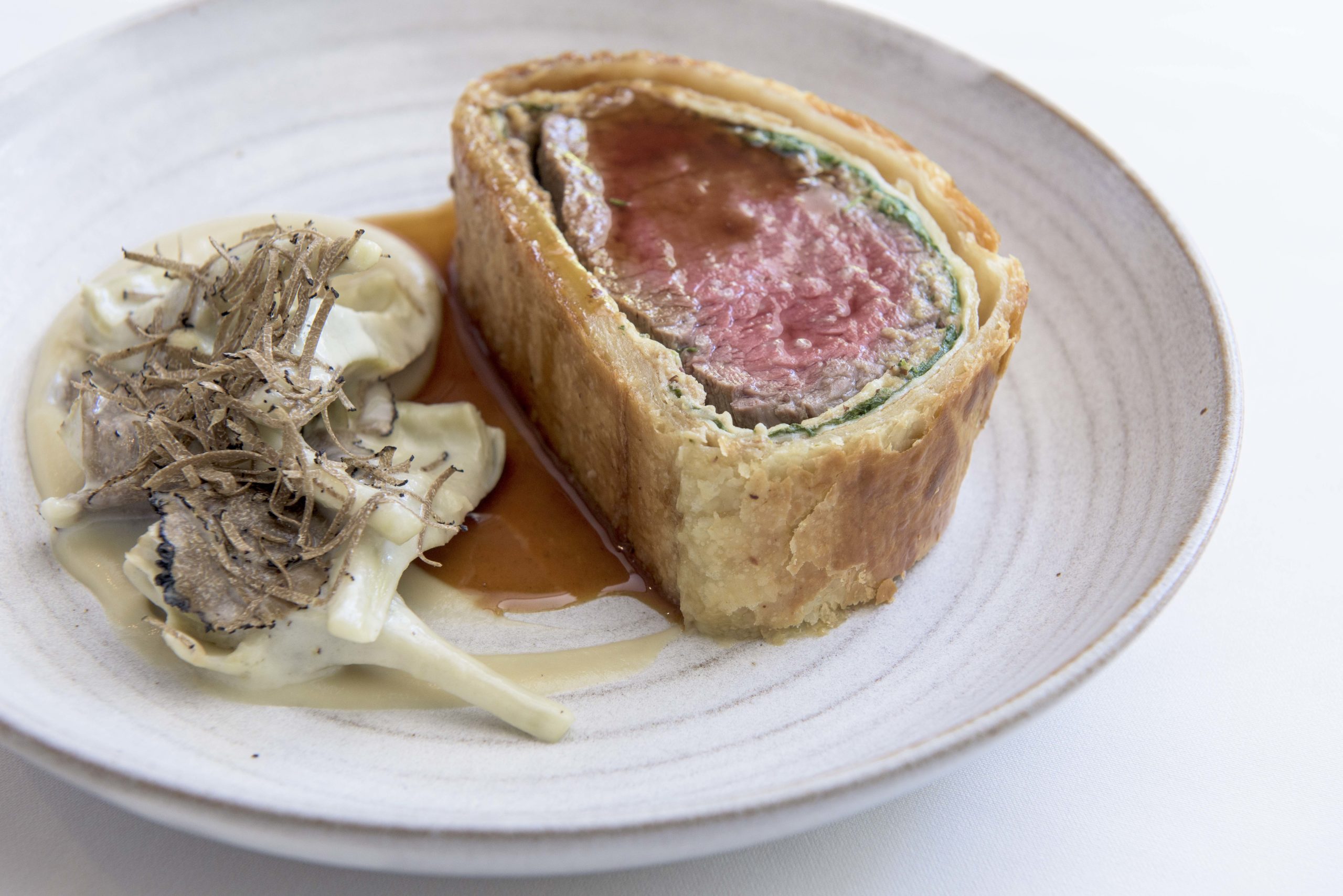 Luxurious Beef Wellington with Warm Baby Artichokes and a Truffle Vinaigrette