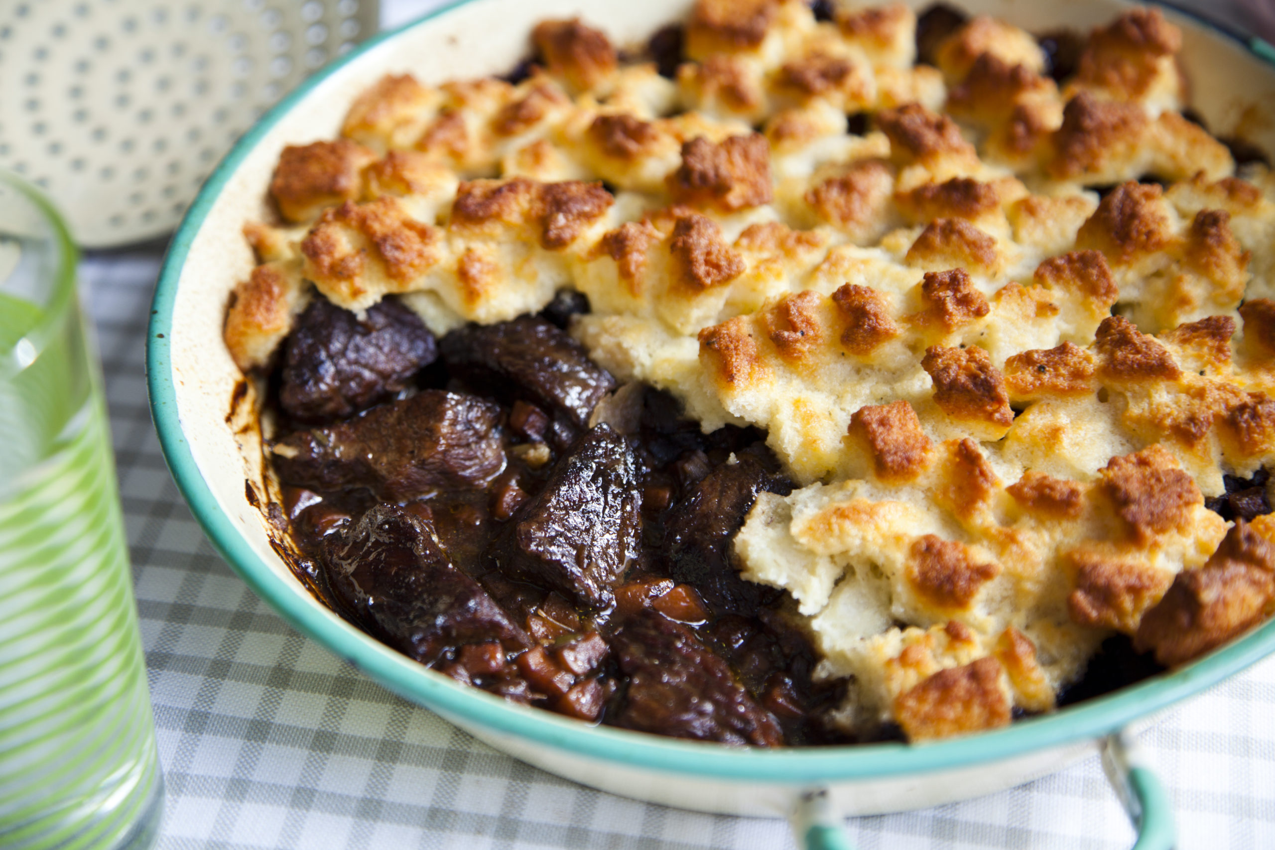 Rosemary infused beef and onion souffle with buttered peas