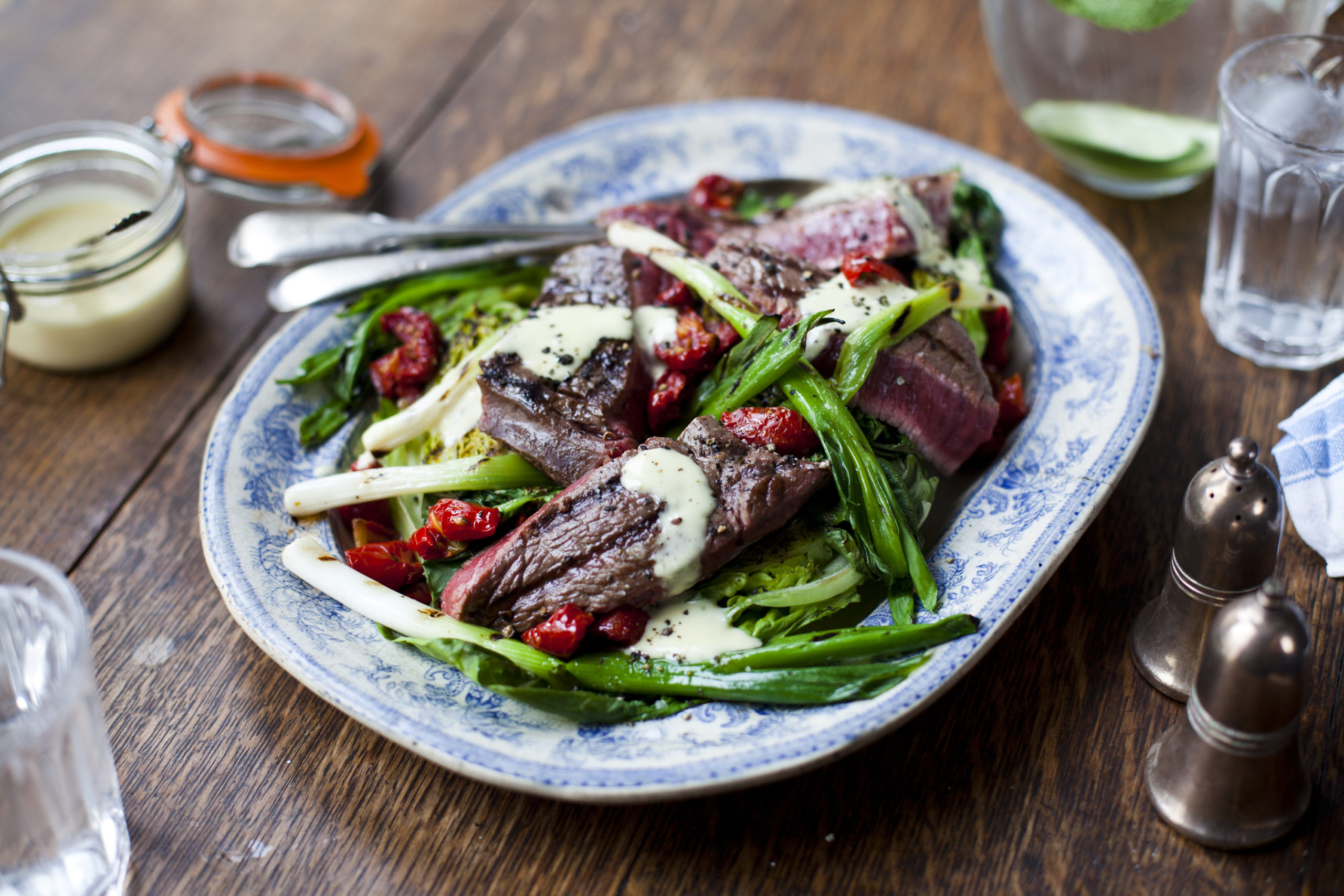 Warm roast beef salad with griddled spring onions