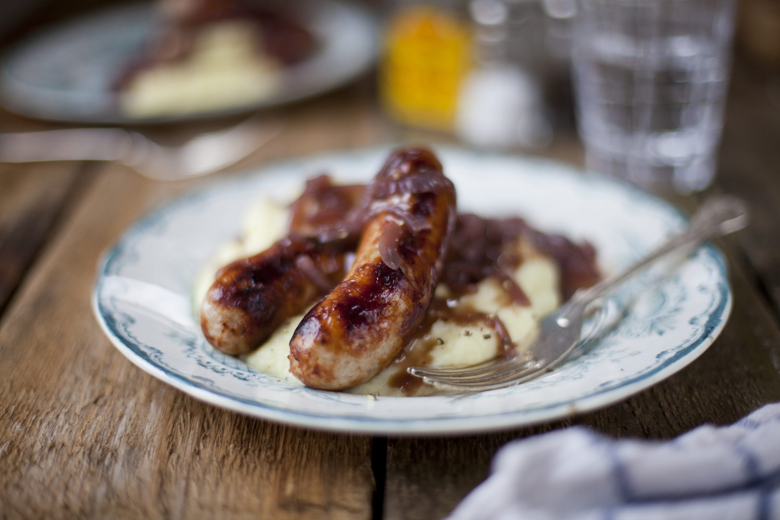 Beef Sausages with Garlic Mash and Caramelised Onion Gravy