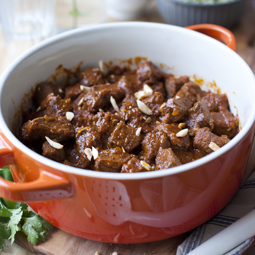 Moroccan beef tagine served with fresh green couscous