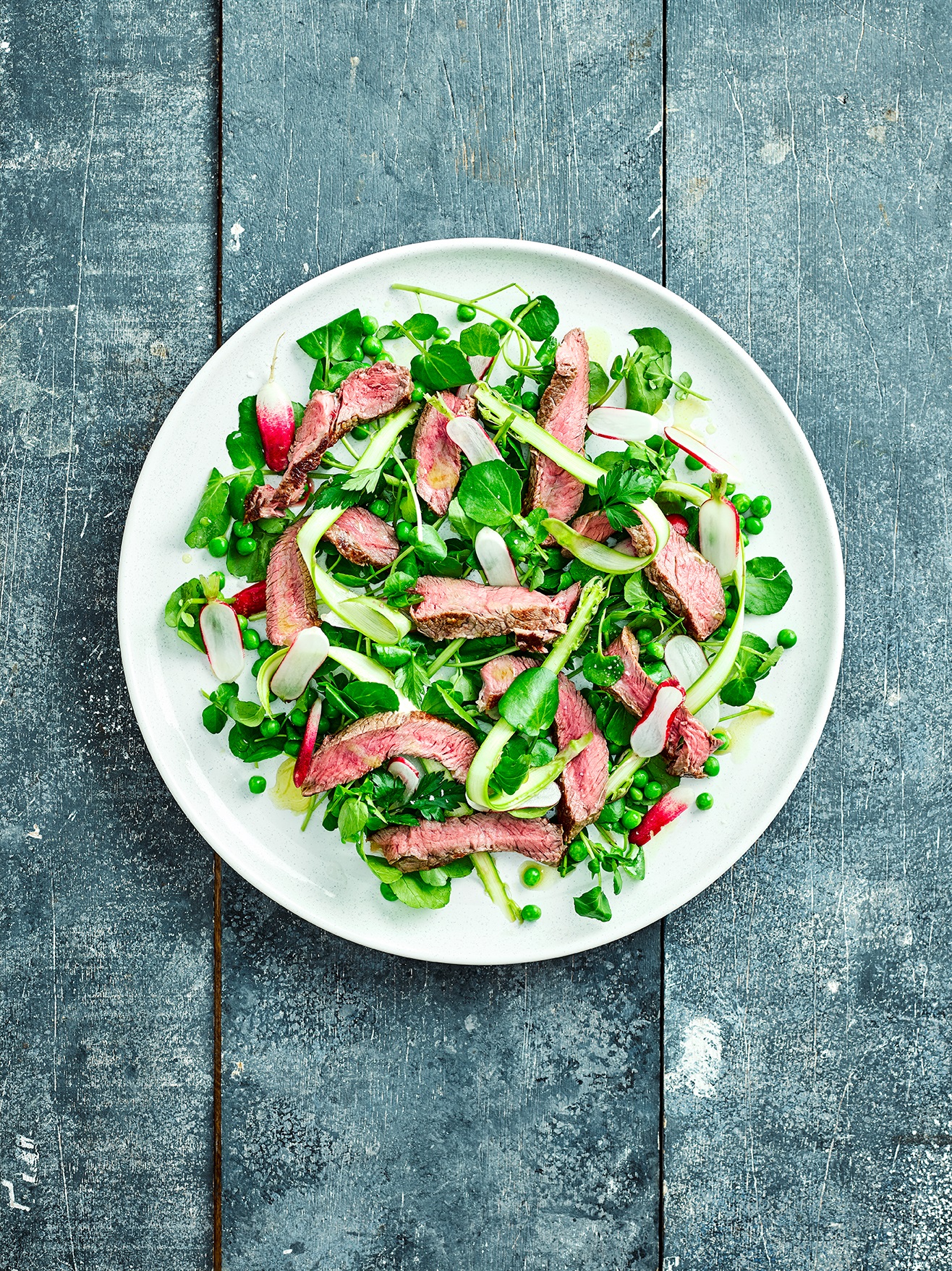 Sirloin steak with shaved asparagus and watercress salad