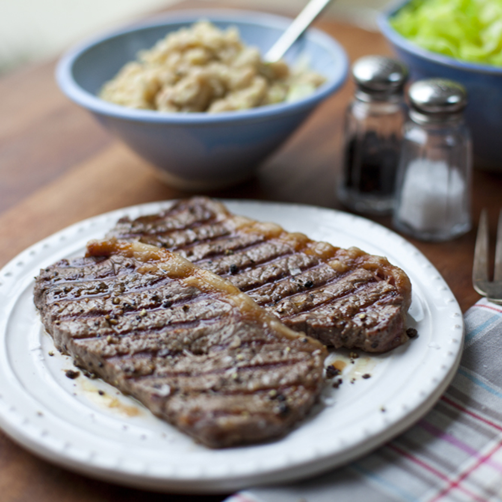 Minute Steaks with White Bean Purée and Sautéed Savoy Cabbage