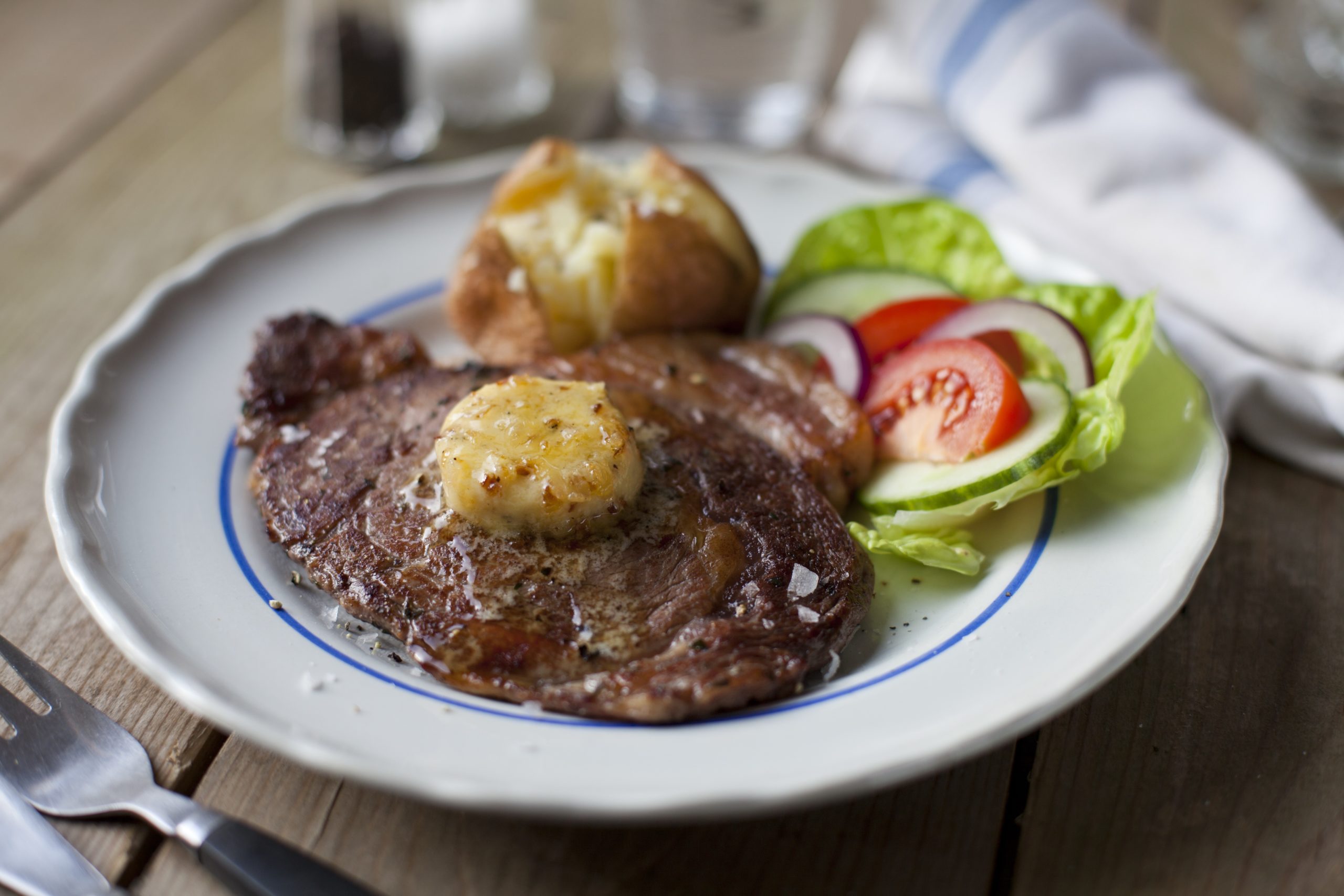 Grilled Rib-Eye Steak with Peppered Shallot Butter