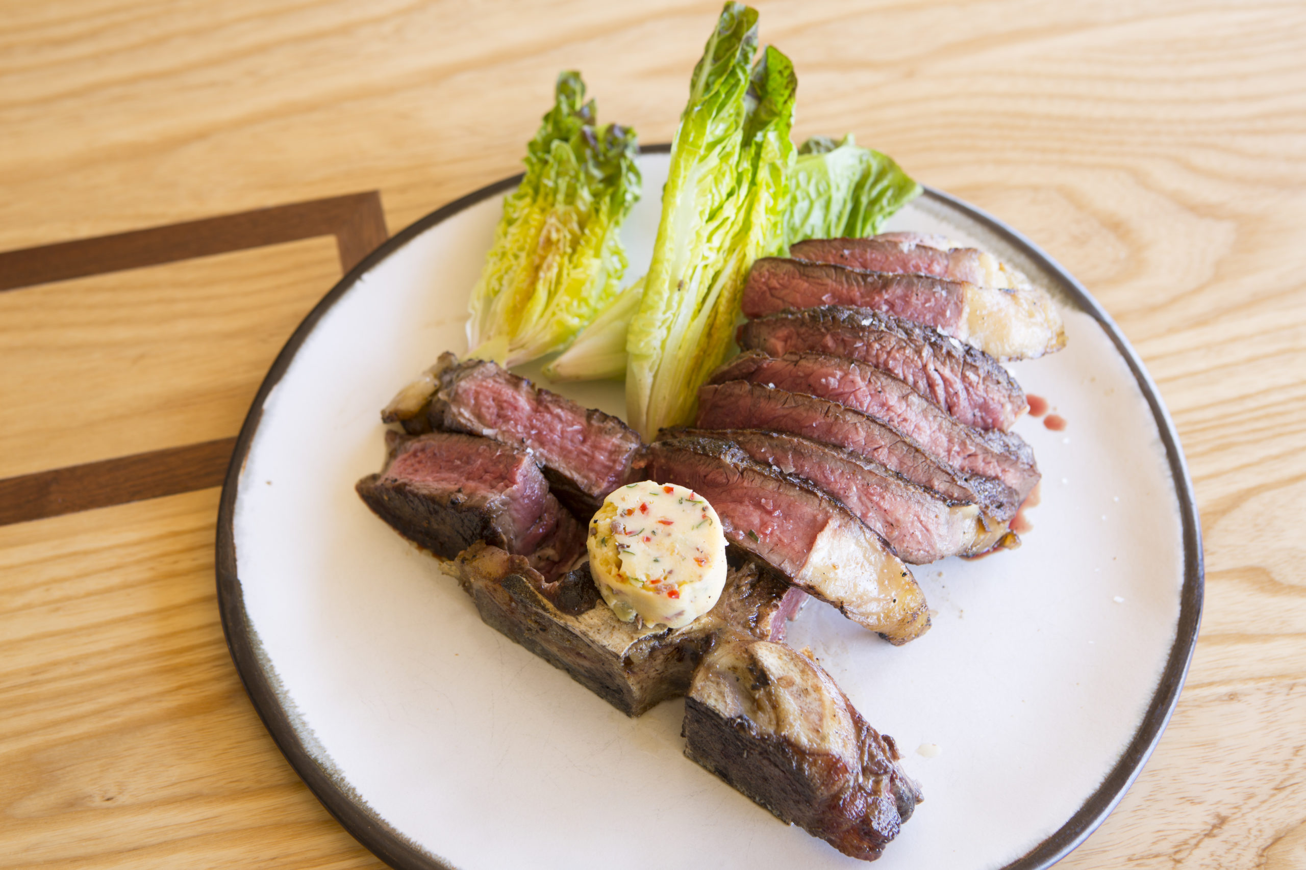 Barbecue T-bone Steak with Devilled Butter and Oxtail Macaroni Cheese