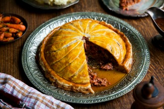 Braised beef and sausage pithivier with honey-glazed carrots