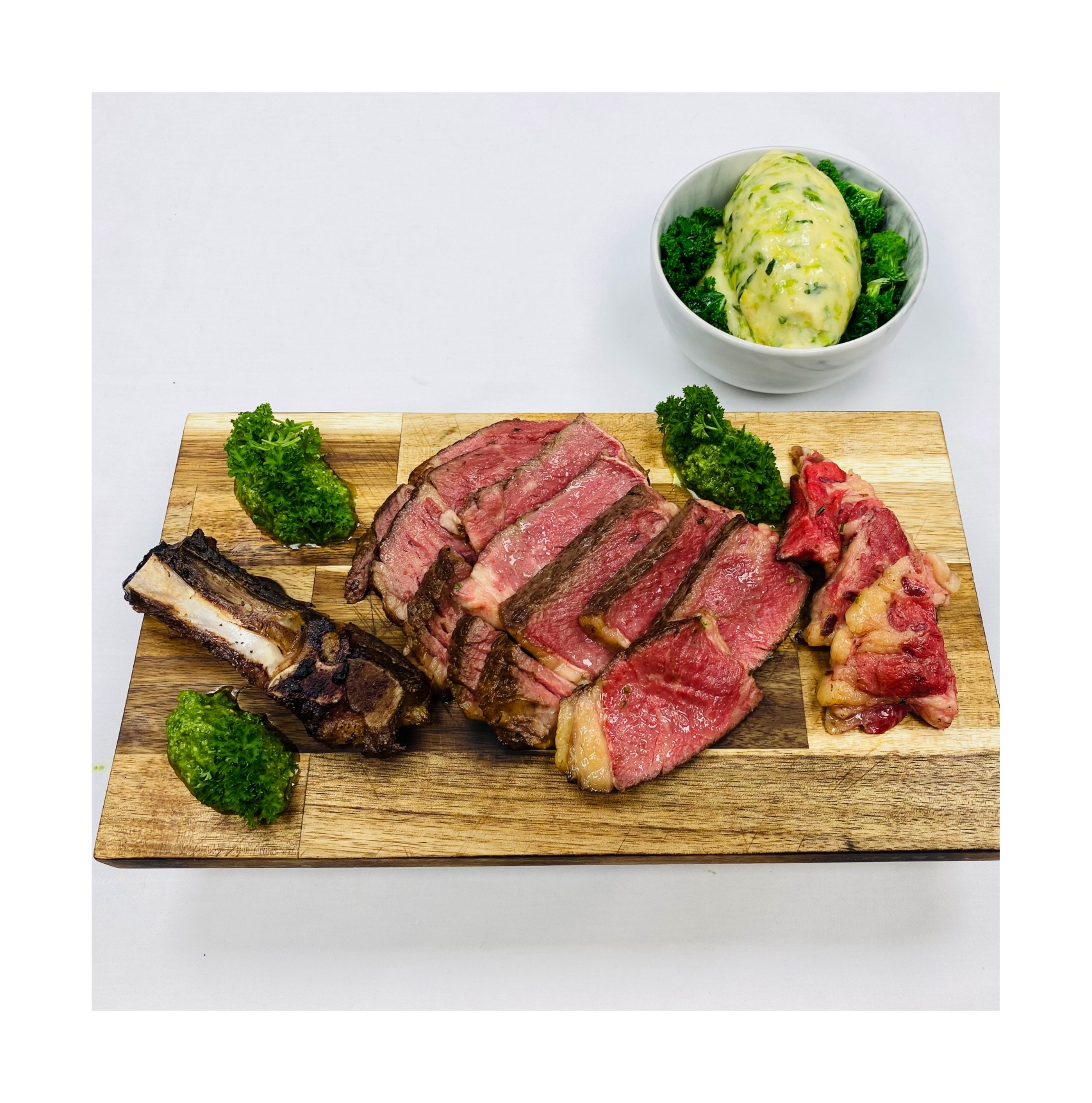 Carved beef feast on chopping board