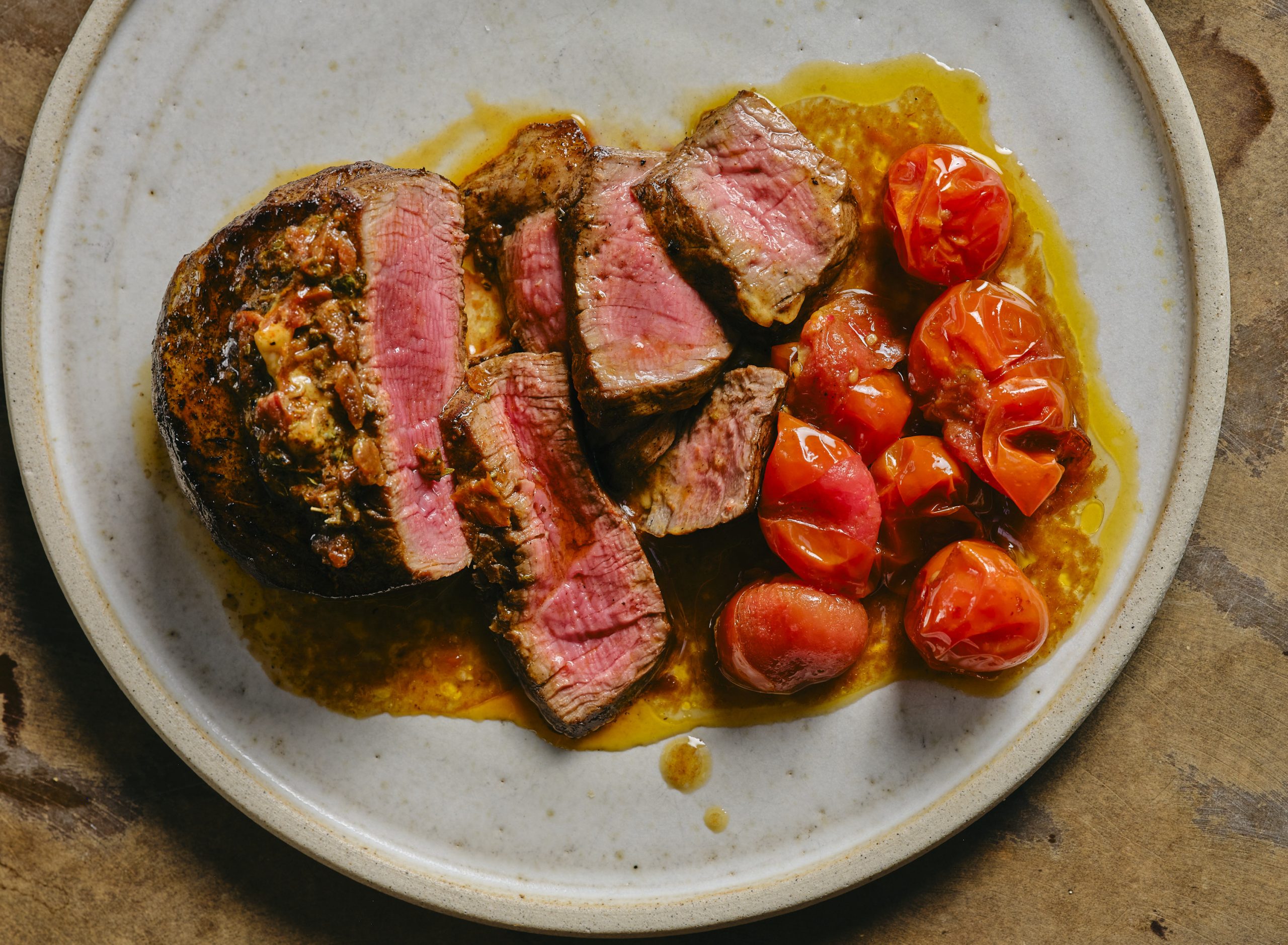 Tomatoes, rare steak and chips